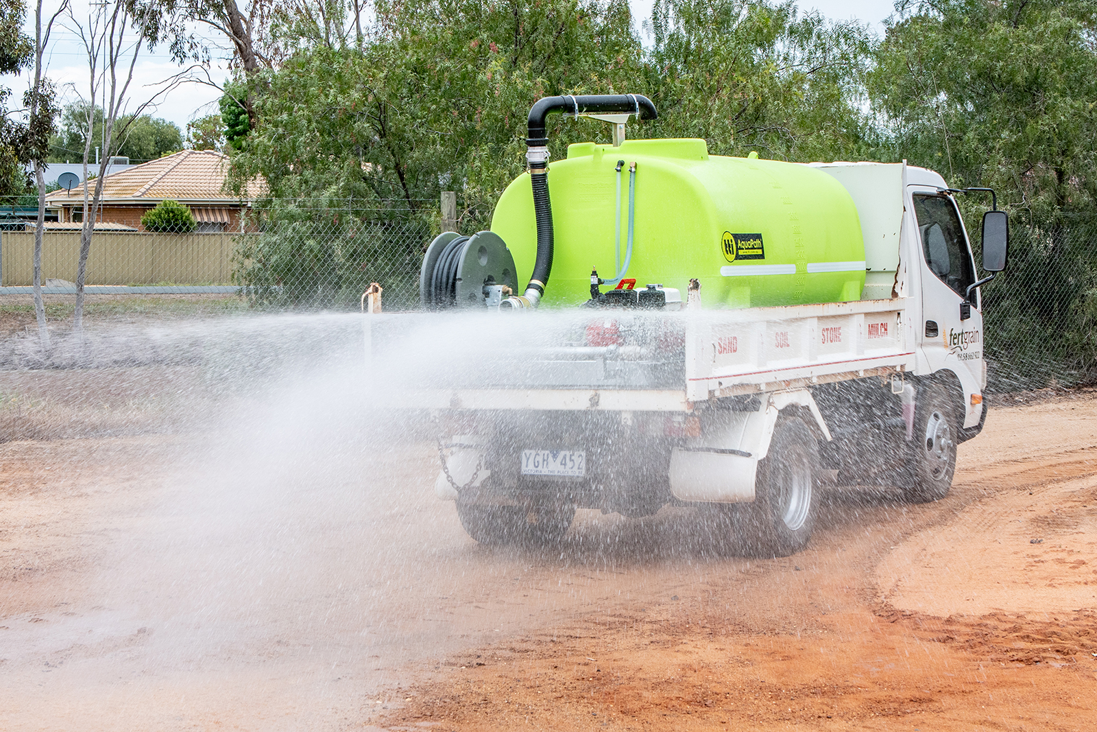 Water tank on transport cart releasing water