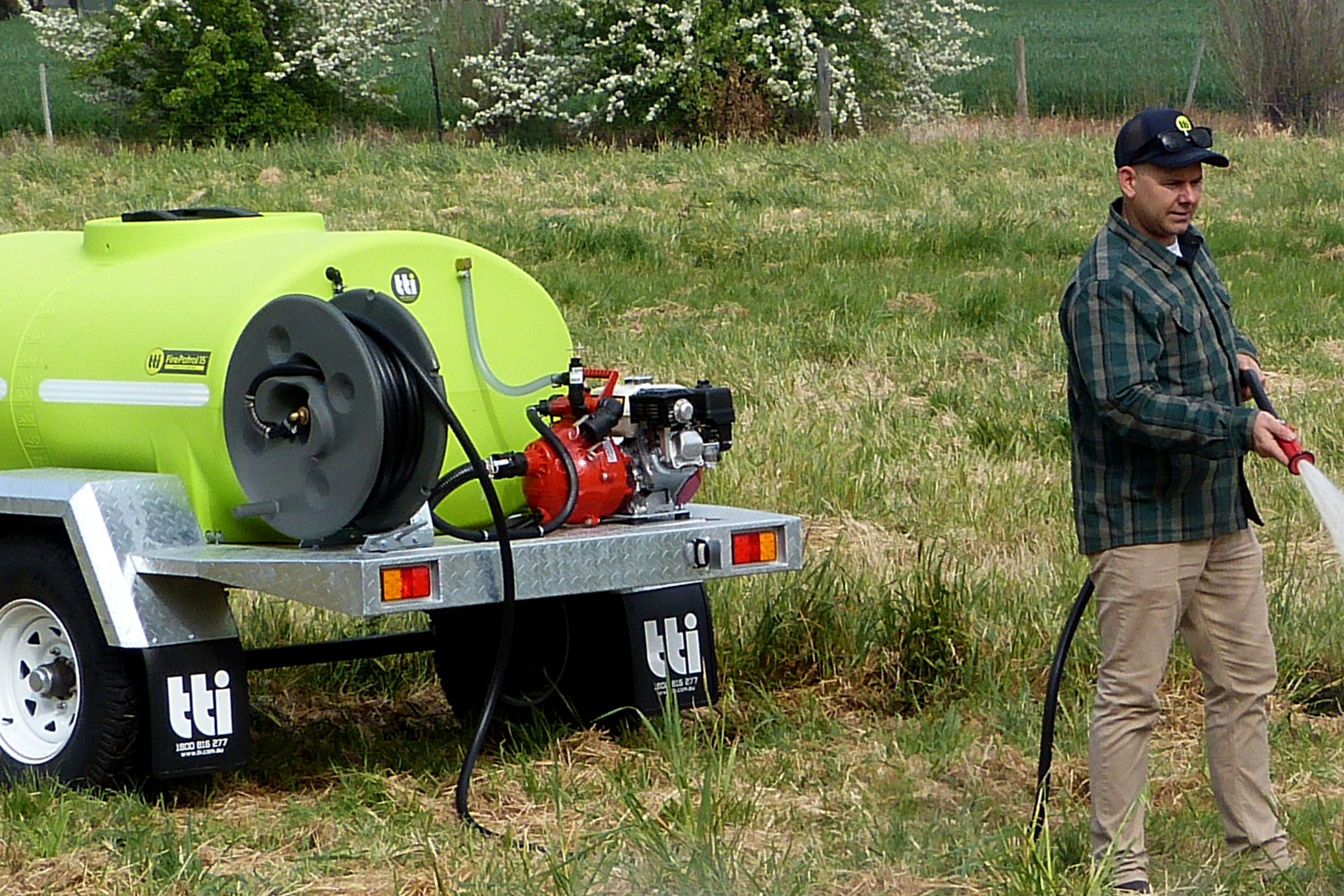 Fire hose reel releasing a water
